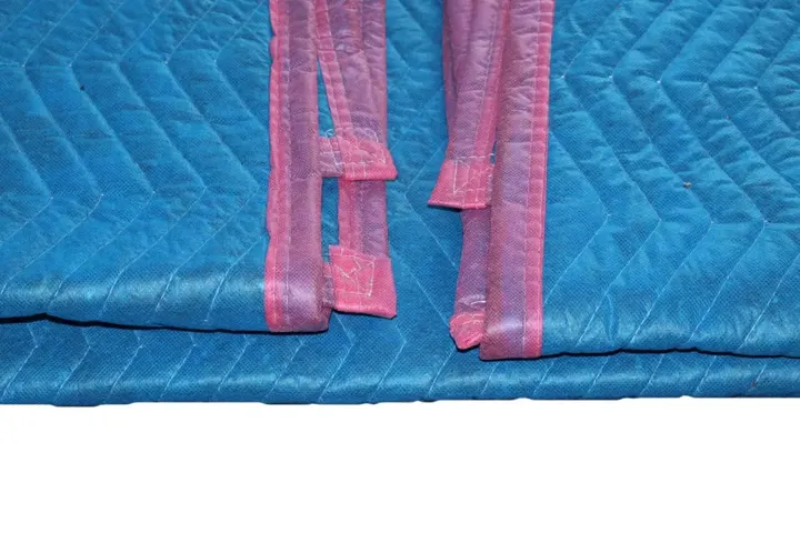 Baby blue cotton moving pad seam with pink trim