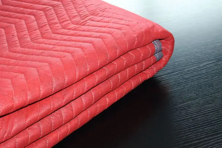 Red cotton moving pad quilted stitching detail