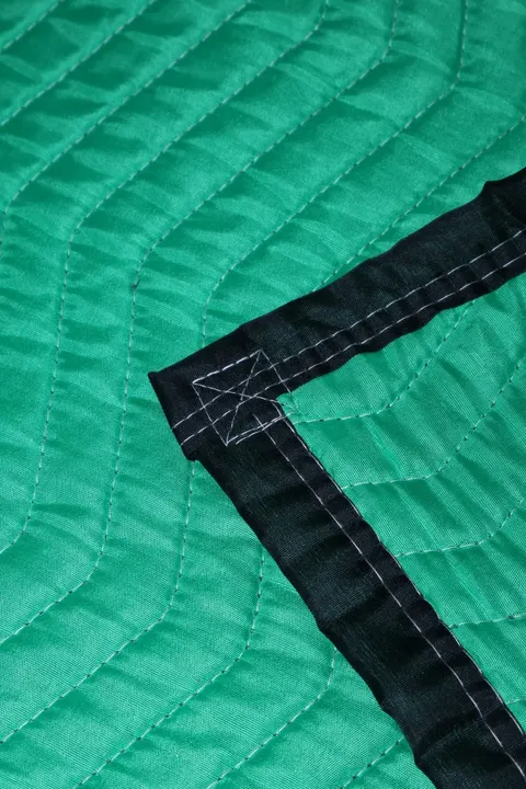 Green polyester moving pad black trim detail
