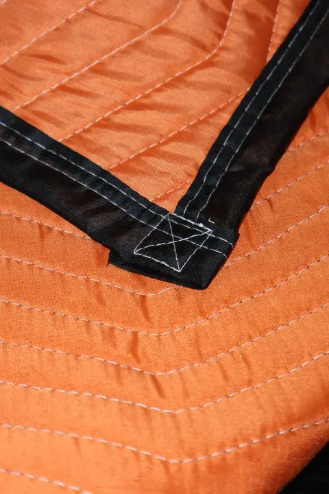 Orange polyester moving pad black trim detail