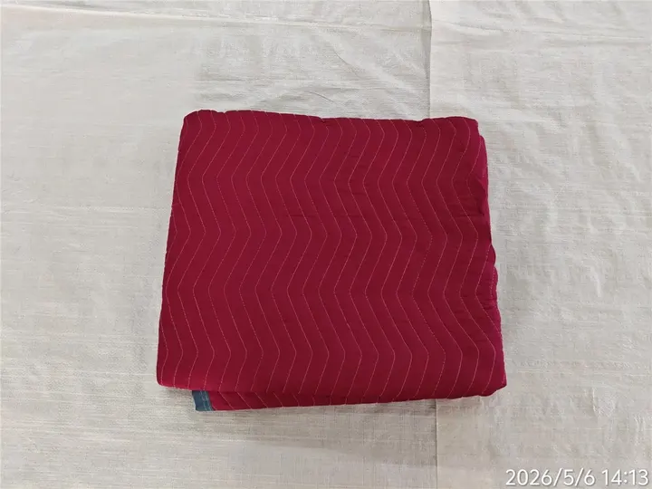 Folded red polyester moving pad