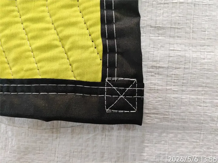 Yellow polyester moving pad corner stitching with black trim