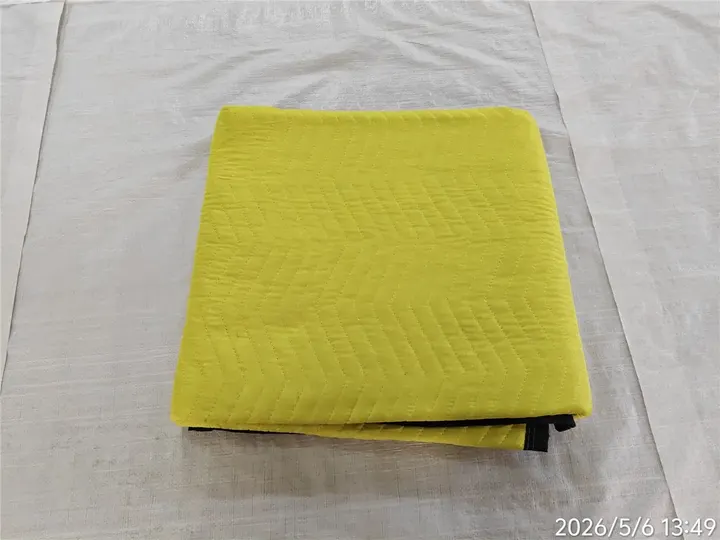 Folded yellow polyester moving pad